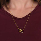 Collier de cœurs entrelacés - Variantes en or jaune et blanc